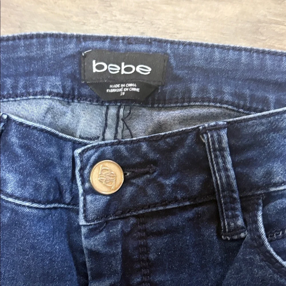 Bebe Women's Distressed Dark Blue Skinny Jeans